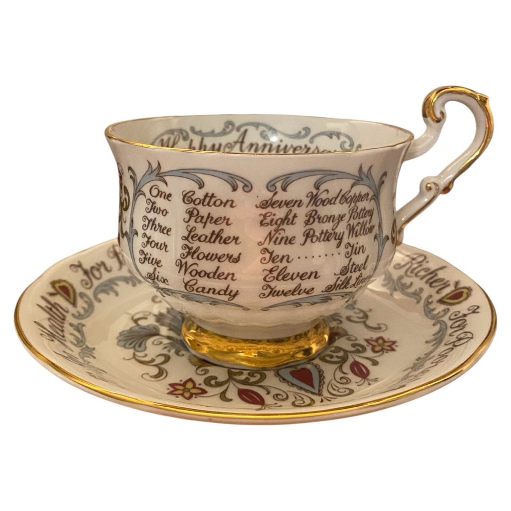 Paragon 
Happy Anniversary
Gold and White Anniversary Teacup and Saucer